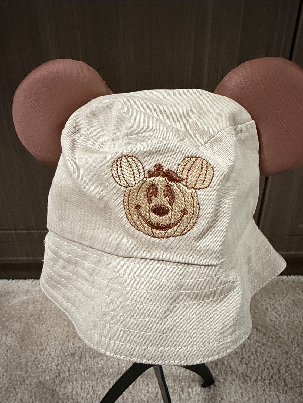 Infant Cream pumpkin Bucket Hat with Brown Embroidered Character and Ear Accents